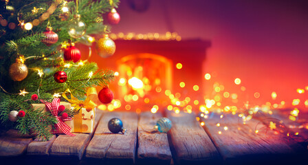 Gift Under Christmas Tree With Baubles In Home Interior With Fireplace And Abstract Defocused...