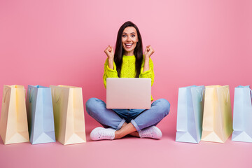 Photo of charming cheerful overjoyed lady wear stylish clothes sit floor rejoice special autumn...