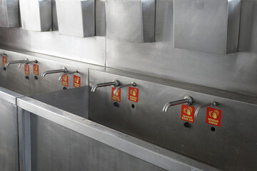 hand washing taps with sensors for the public and sensor tap signs