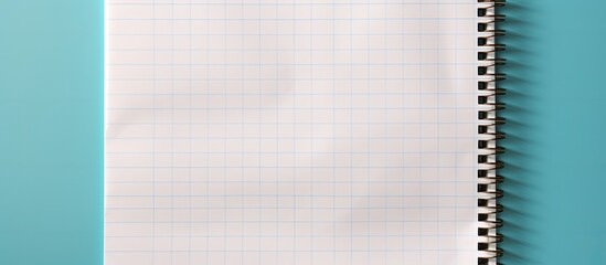 Squares on one page of exercise book paper for math with blank lined worksheet Empty writing notebook template with school and office stationery Closeup of paper texture With copyspace for t