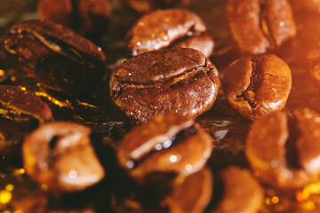 Roasted coffee beans in raindrops background golden veins.
