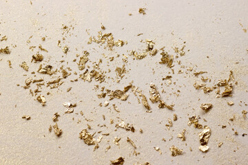 Glowing sparkles on beige watercolor background