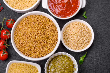 Raw bulgur wheat porridge as an ingredient for preparing a delicious dish