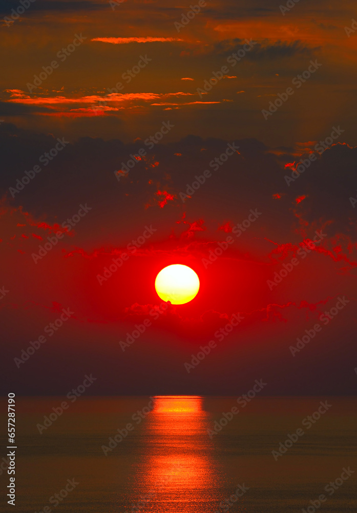 Wall mural red sunrise with sun track on sea - Wall murals