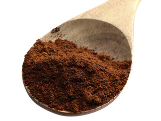 Ground coffee pile in wooden spoon, isolated on white 