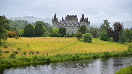 Fototapeta na wymiar Inveraray Castle on the shore of Loch Fyne, view from a distance, Argyll county, Scotland