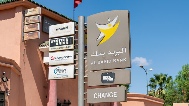 Logo and sign of Al Barid Bank with signs of services they provide. Al Barid Bank is a Moroccan bank known for its accessibility. with branches all over Morocco