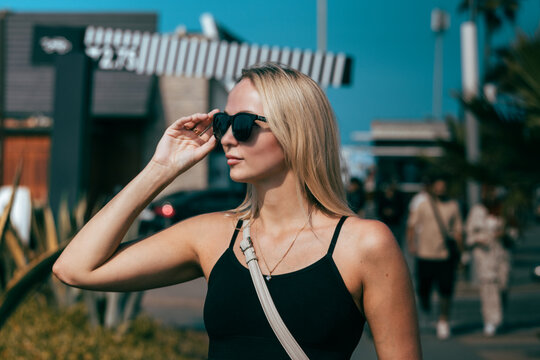Beautiful Russian girl at the beach during summer