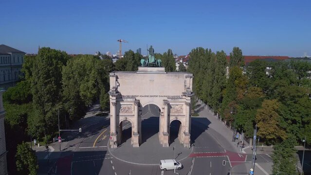 Unbelievable aerial top view drone Victory Gate car street town Munich Germany 