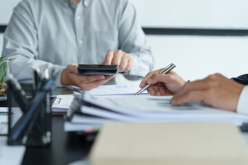 Woman Analysis Business Accounting working with Individual income tax return Accounting concept..