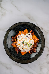 ravioli with chanterelle mushrooms on grey