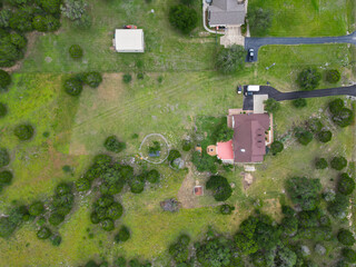 a back yard with a green lawn 