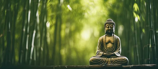 Foto op Plexiglas Statue of Buddha amidst bamboo trees © 2rogan