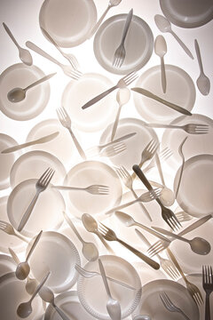 Pattern of backlit plastic plates and forks