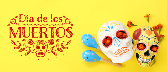 Greeting banner for Mexico's Day of the Dead (El Dia de Muertos) with painted human skulls, maracas and flowers