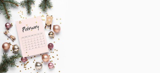 Paper calendar for February with Christmas decorations on white background with space for text