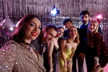 Young people taking selfie on prom night - obrazy, fototapety, plakaty