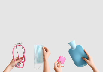People with medical supplies on light background