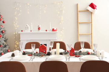 Festive table setting with Christmas decor at home