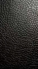 Closeup of faux leatherlook rubber with a hammered metal texture. The surface has a shiny and hammered metal finish, with a textured appearance that resembles hammered metal. This texture