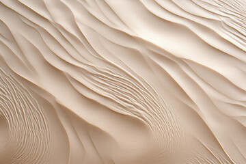 Texture of rippled sand on a serene shoreline, with delicate swirls and patterns created by the wind.