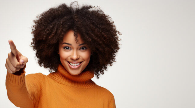 Cheerful Afro woman pints away on copy space, HD
