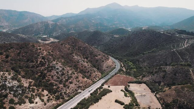 The gorge of Topolia in Crete seen from aerial perspective running along the road leading to Elafonissi via Elos. . High quality 4k footage