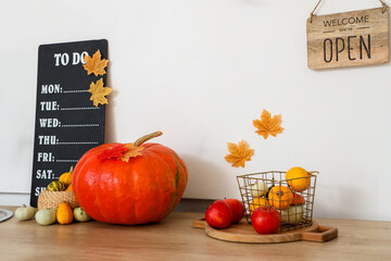 Kitchen counter with Halloween pumpkins in festive kitchen