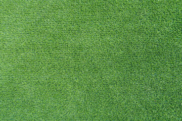 Artificial grass texture. Green meadow field for sport background.