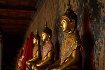 Statue of Buddha sitting meditation in the temple. Religious background.