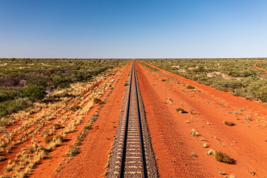 Train tracks passing through the desert in outback Australia