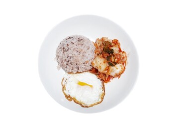 Breakfast on a white plate on a white background