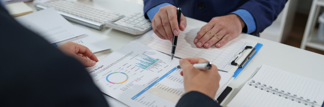 Business Team Negotiation, Analysis, Discussion, Asian Woman Economist And Marketer Pointing To A Financial Data Sheet To Plan Investments To Prevent Risks And Losses For The Company