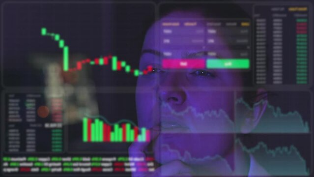 A woman looks at a virtual screen with a HUD menu in the dark. Stock charts. Broker terminal. 