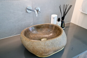 A washbasin made out of actual stone