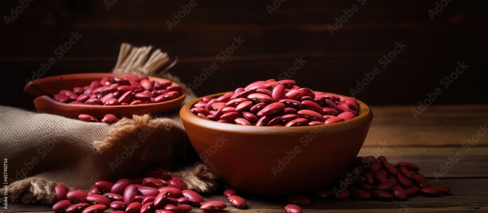 Poster selective focus on dry adzuki beans in clay bowl on isolated pastel background copy space en table s