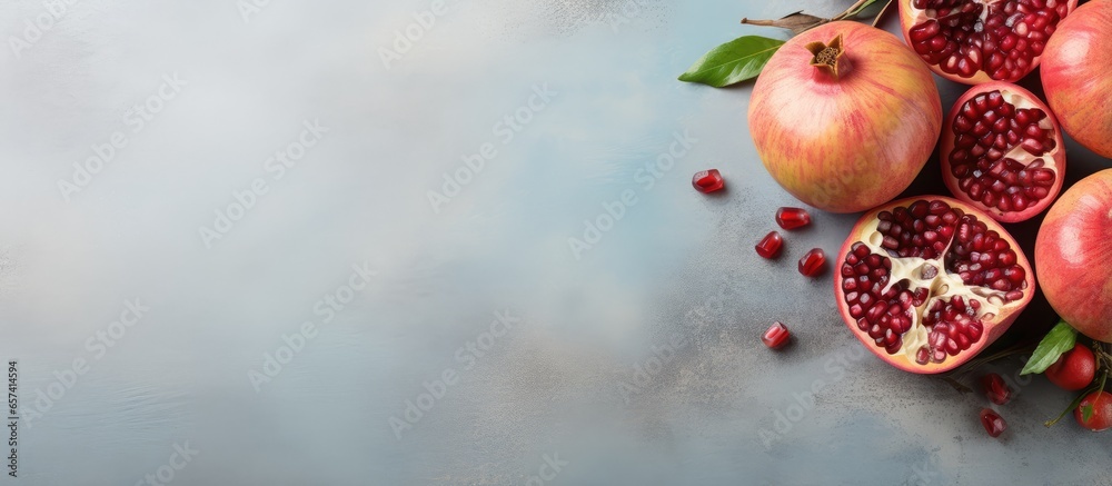 Poster pomegranates on isolated pastel background copy space ready for text