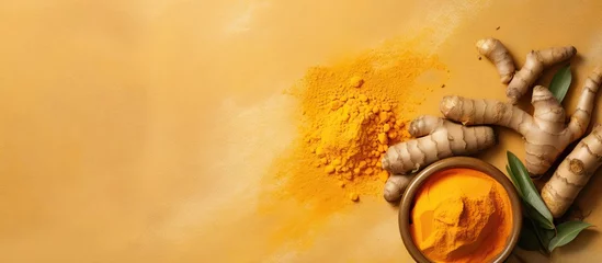 Fotobehang Raw turmeric extracted isolated pastel background Copy space © HN Works