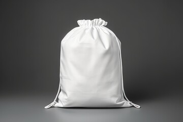 white drawstring bag isolated on a white background - obrazy, fototapety, plakaty