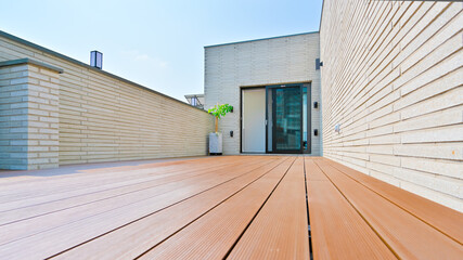 A durable artificial wooden deck was installed on the rooftop