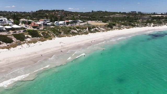 Amazing beauty at Perth beach. Mullaloo beach white sand with dog walkers filmed in 4k