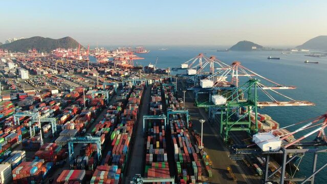 4k footage of modern industrial port with containers from aerial view,
It is an import and export cargo port that is part of the Busan shipping dock in South Korea.