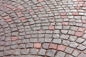 Stone pavement on the sidewalk as an abstract background. Texture