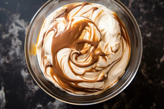 Chocolate And Vanilla Ice Cream Swirl In A Clear Bowl