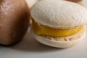 close up view, chocolate and lemon desserts on light background. Sweets. Place for inscription