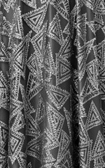 Draped black and white fabric detail.Fashion background