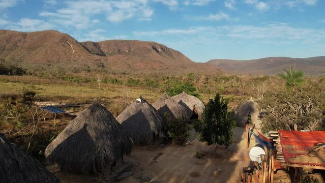 aerial view village in Chapada dos Veadeiros "Aldeia Macaco" hollow-shaped bioconstruction houses cerrado landscape Goi&aacute;s Brazil