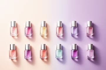 Foto auf Acrylglas Nail polish bottles on pastel background © reddish