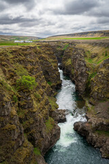 Naklejka na ściany i meble Kolugljúfur Canyon and Waterfall in Víðidalstunga, Iceland