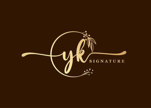 logotype gold signature initial yk logo design isolated leaf and flower